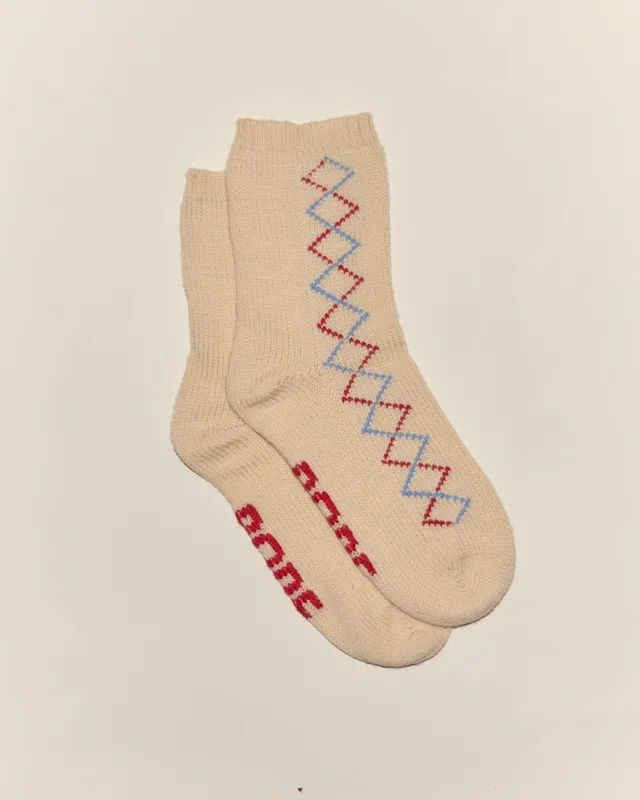 Argyle Sketch Socks sold by BODE