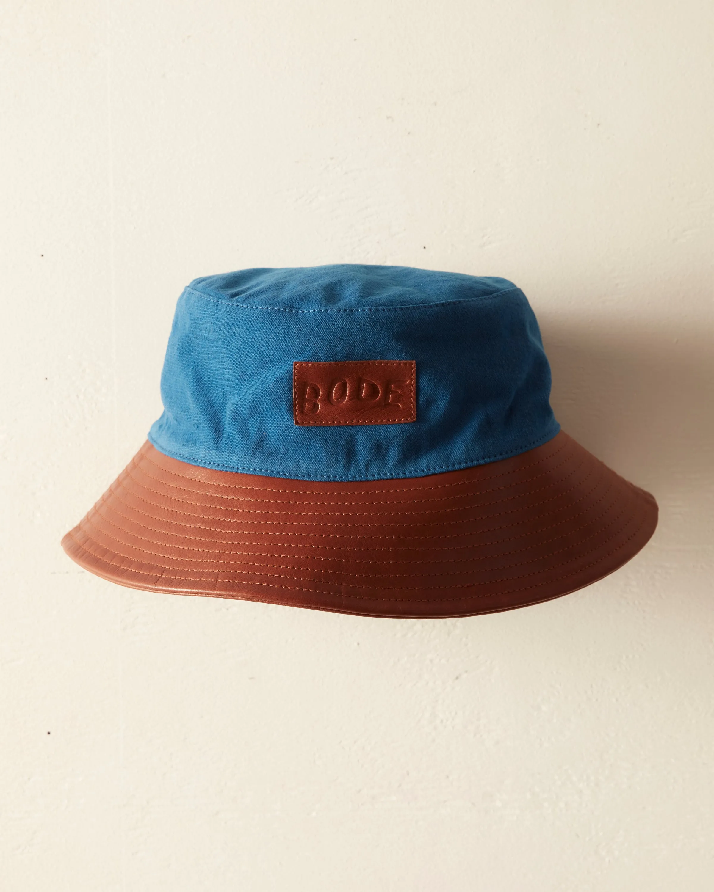 Leather Brim Bucket Hat - Tan/Blue sold by BODE