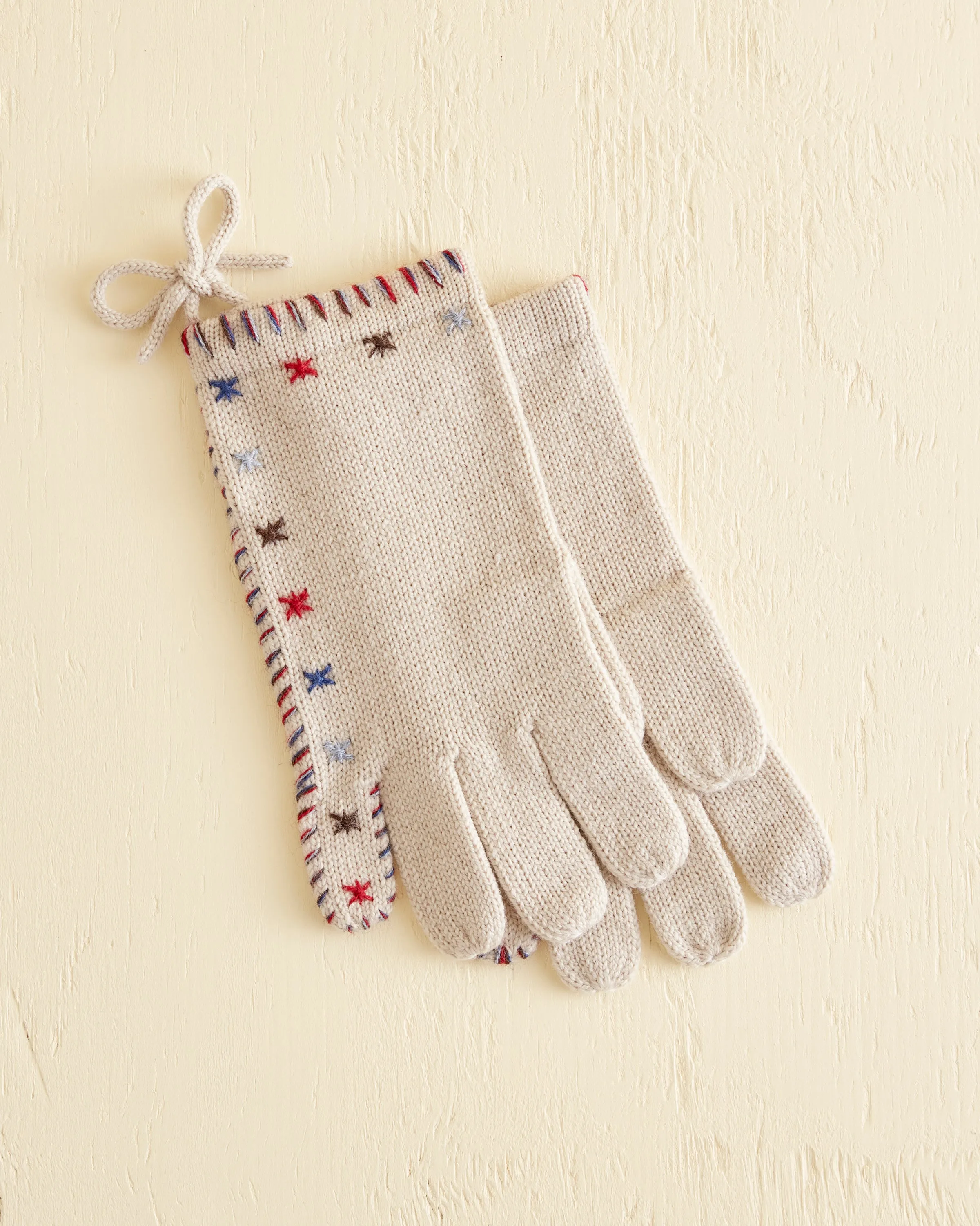 Tiny Star Gloves sold by BODE