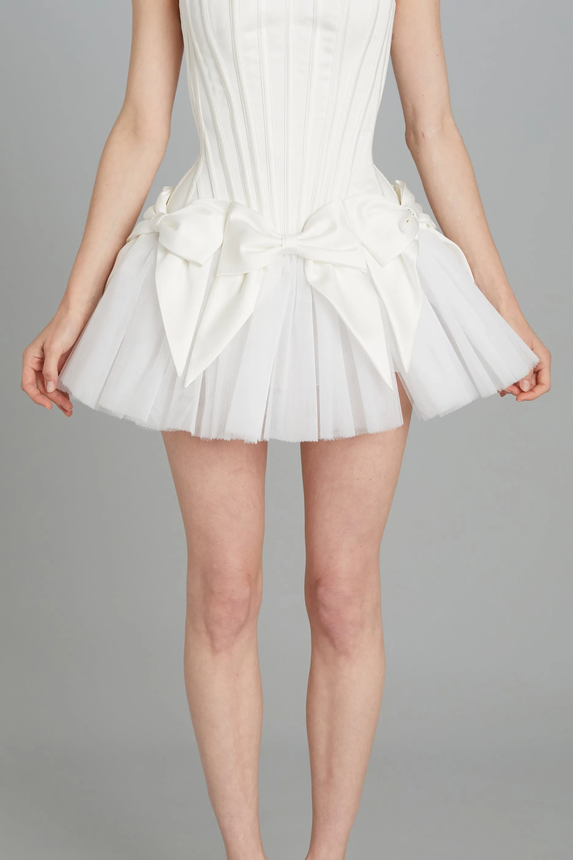 Bow Mini Skirt in Matte Satin sold by Wiederhoeft