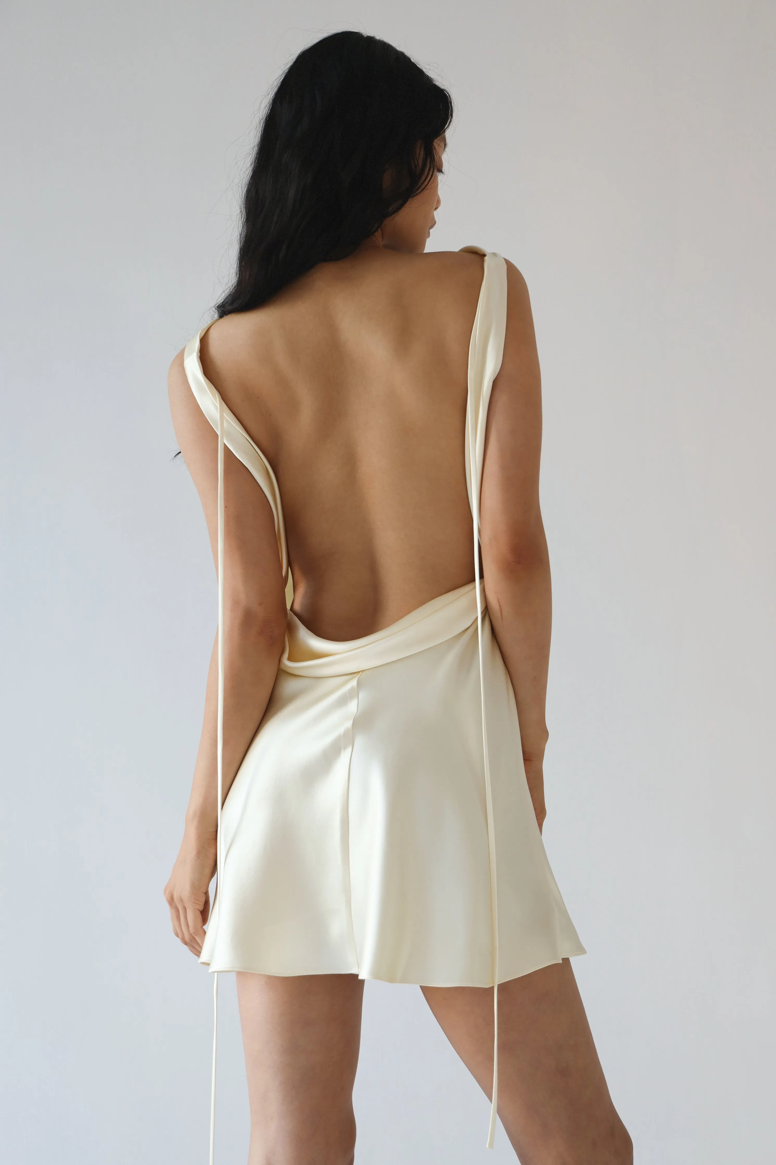 Plunging Back Cowl Mini Dress in Butter sold by Mirror Palais product image thumbnail 3