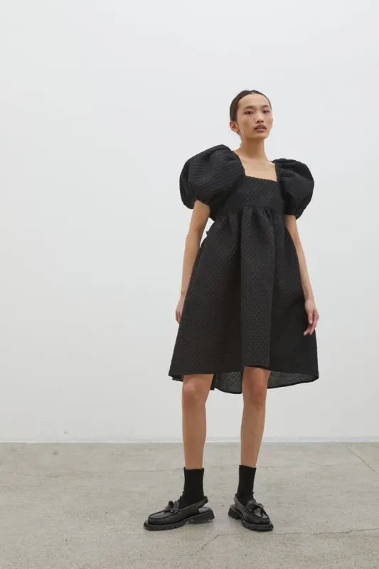 TILDE | DRESS BLOSSOM MATELASSÉ BLACK sold by Cecilie Bahnsen