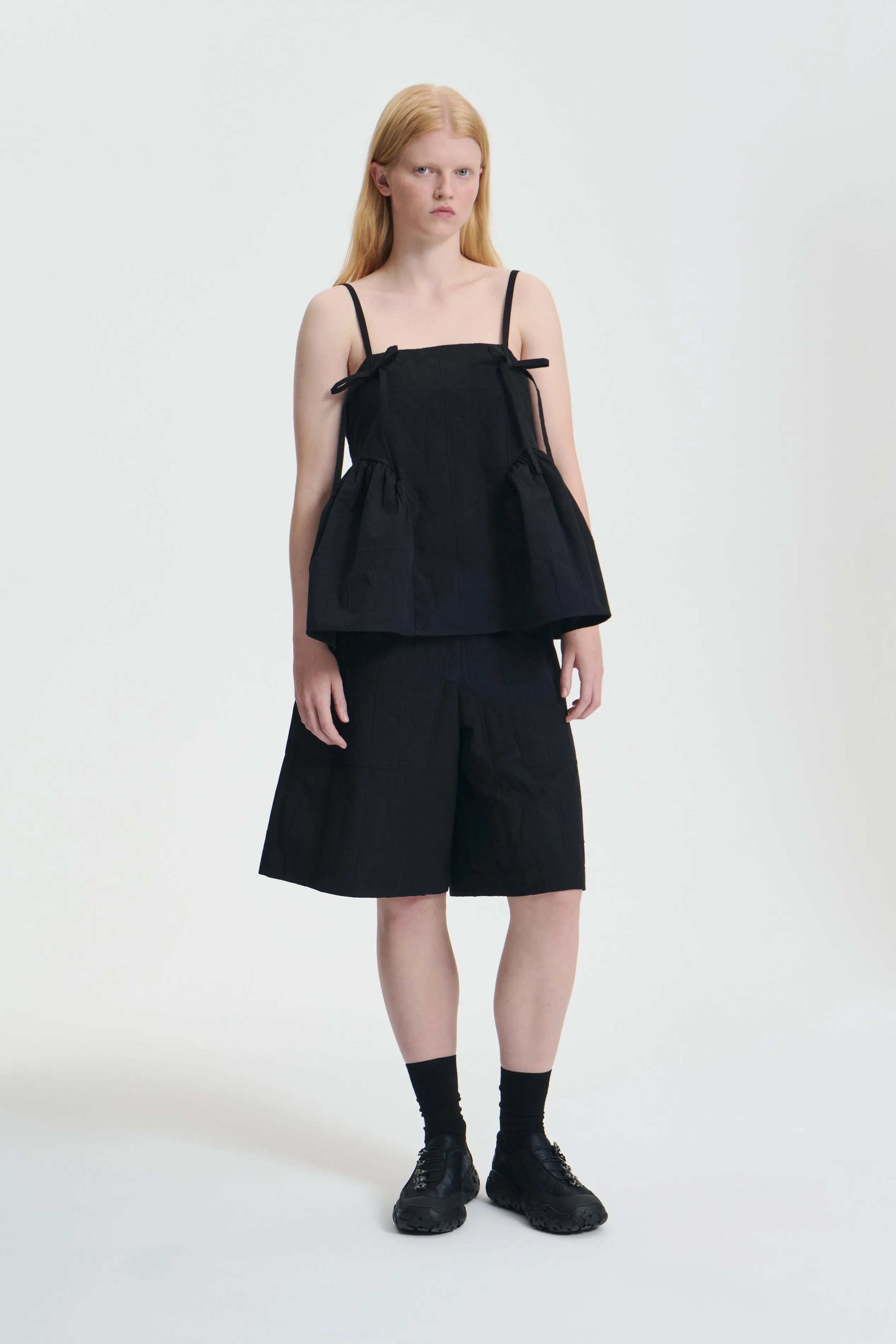 AKIRA | TOP FLORA MATELASSÉ BLACK sold by Cecilie Bahnsen