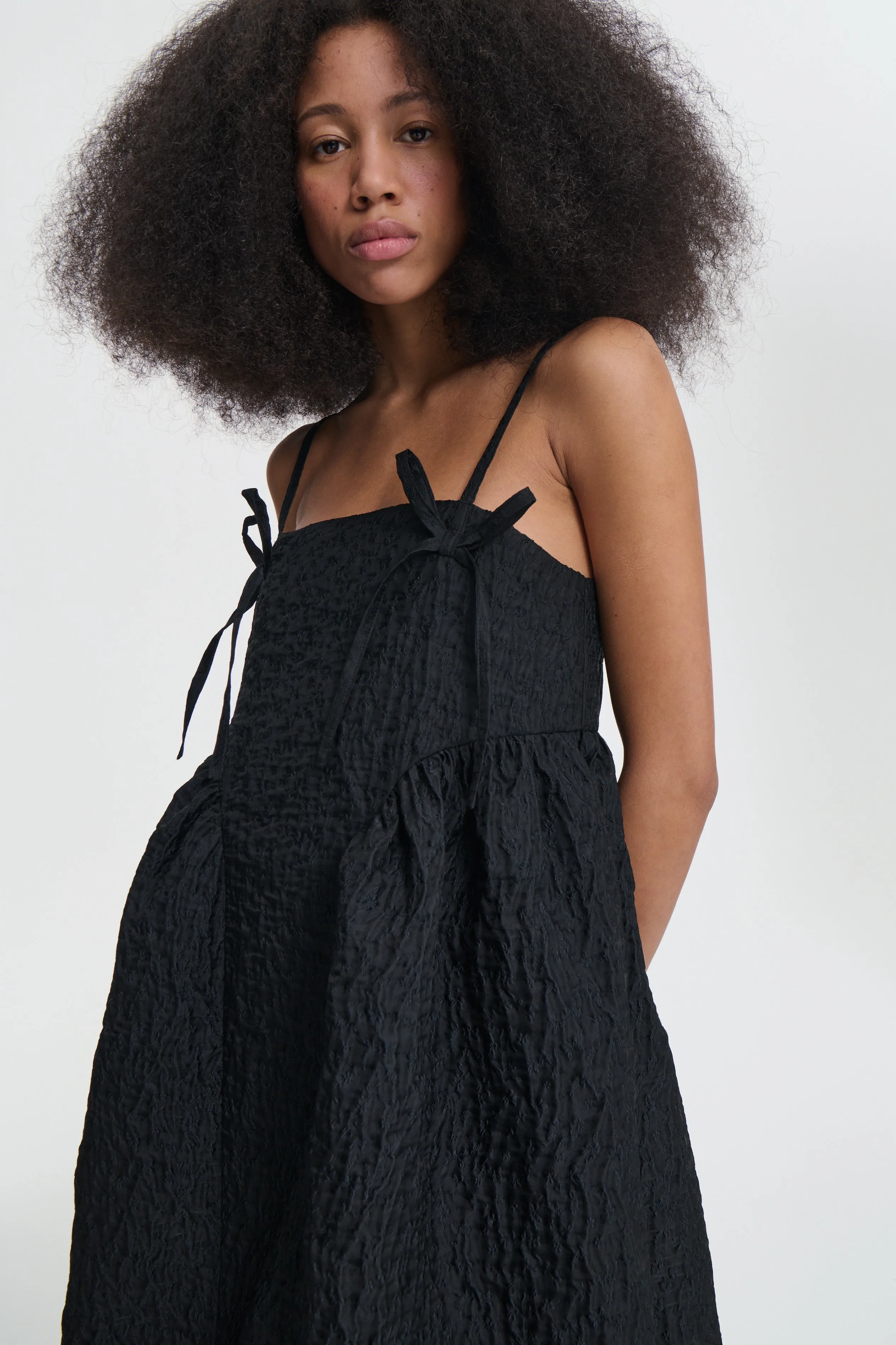 AMBRA | DRESS LOBELIA MATELASSÉ BLACK sold by Cecilie Bahnsen