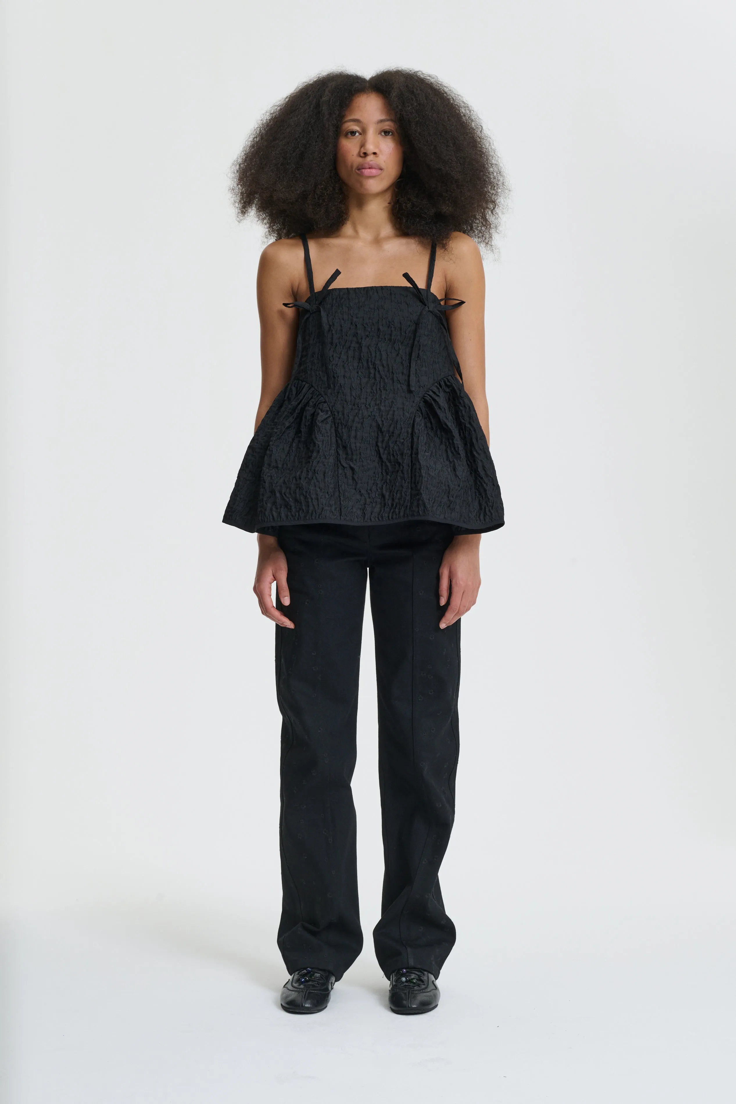 AKIRA | TOP LOBELIA MATELASSÉ BLACK sold by Cecilie Bahnsen