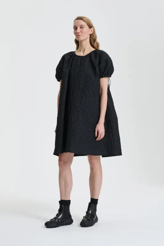 BRENDA | DRESS LOBELIA MATELASSÉ BLACK sold by Cecilie Bahnsen