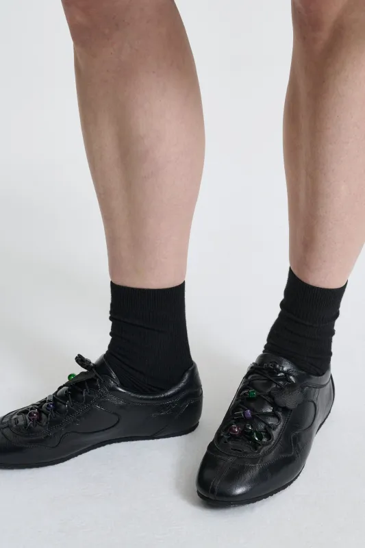 BLAISE | SNEAKER METALLIC LEATHER BLACK sold by Cecilie Bahnsen