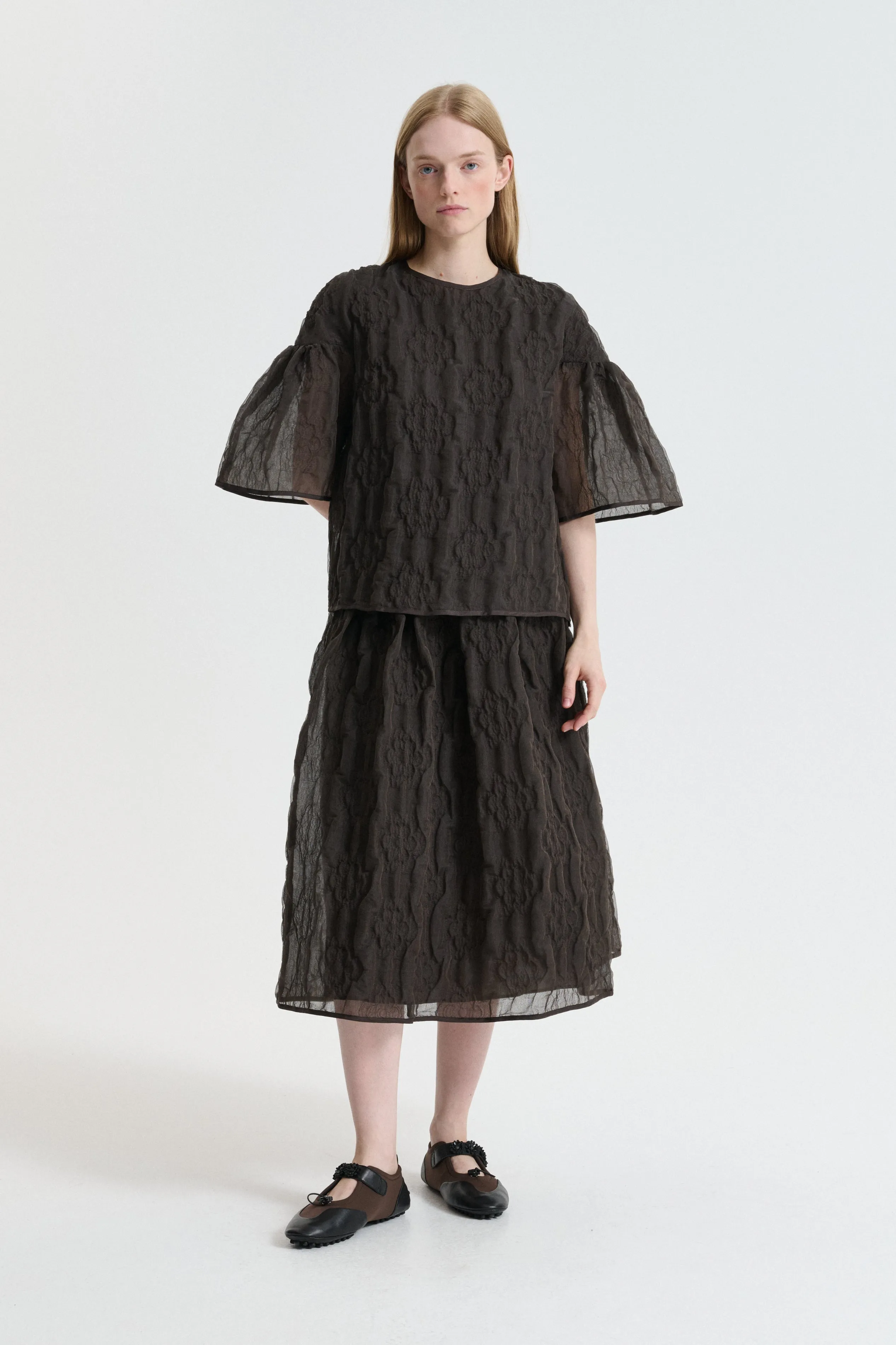 BALA | SKIRT AVENS MATELASSÉ SOIL BROWN sold by Cecilie Bahnsen
