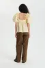 ORIANA | TOP FLURRY MATELASSE SOFT YELLOW sold by Cecilie Bahnsen