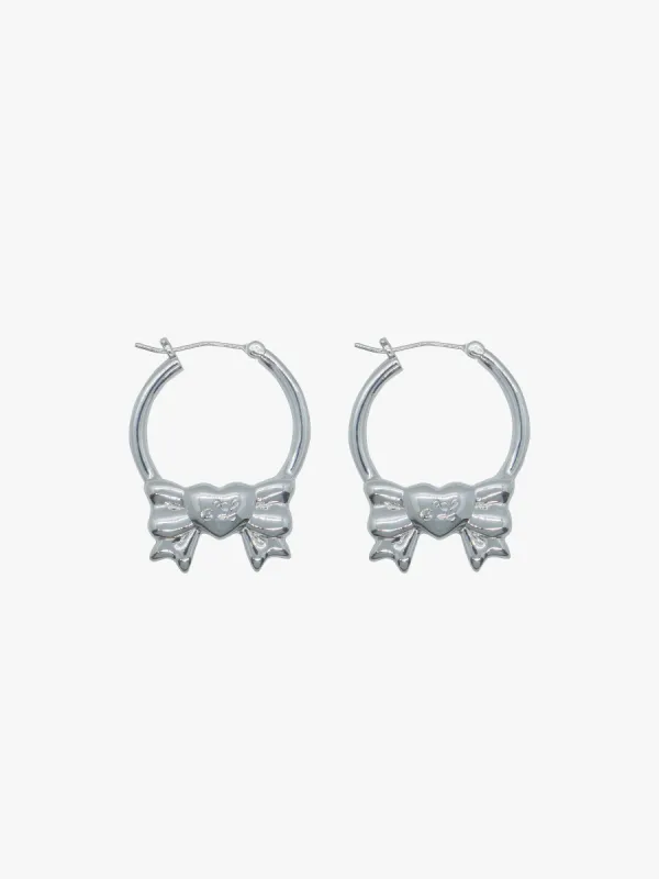 PRESENT HOOPS IN SILVER sold by Sandy Liang