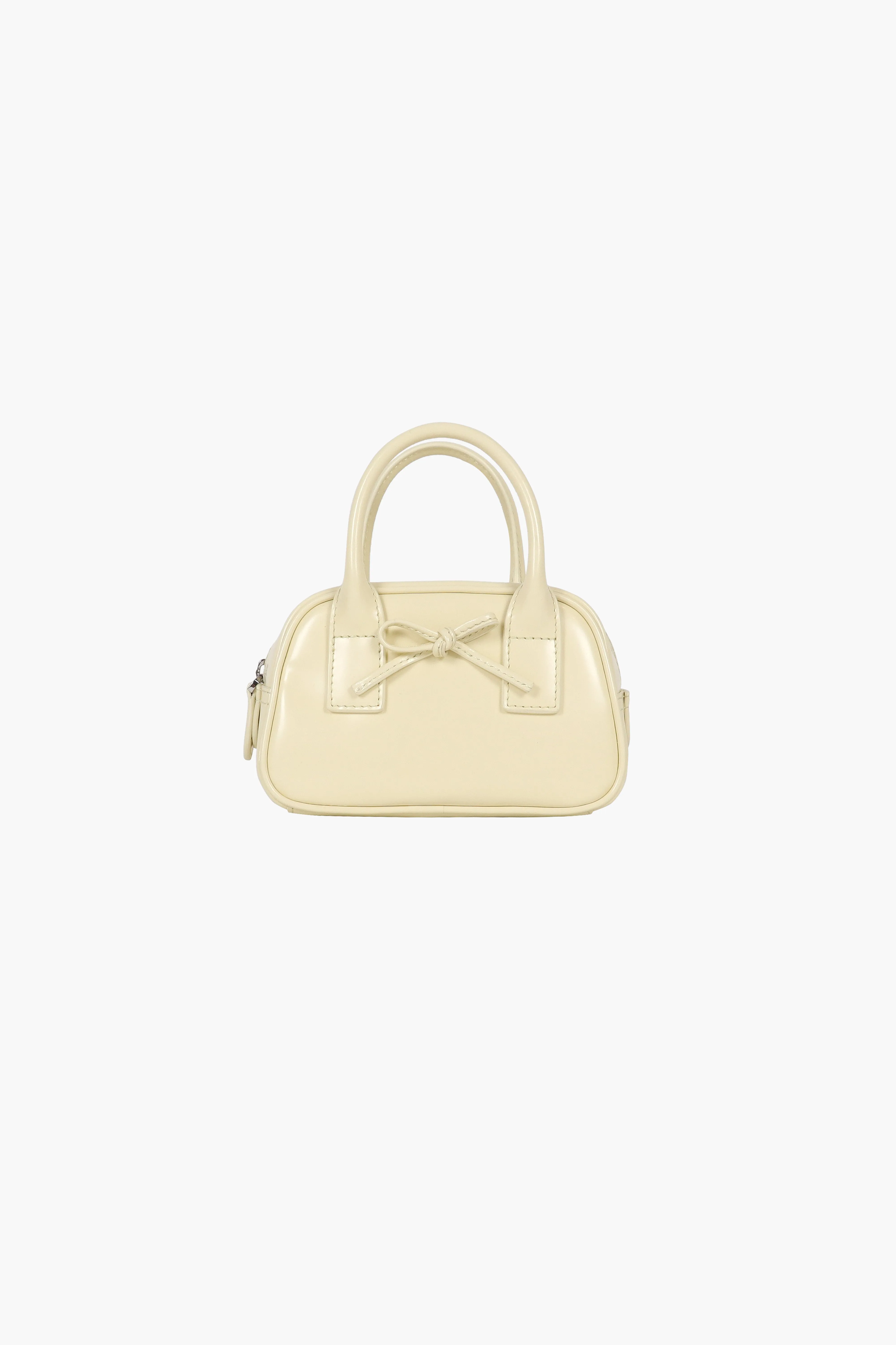 SECURE BAG IN BUTTER sold by Sandy Liang