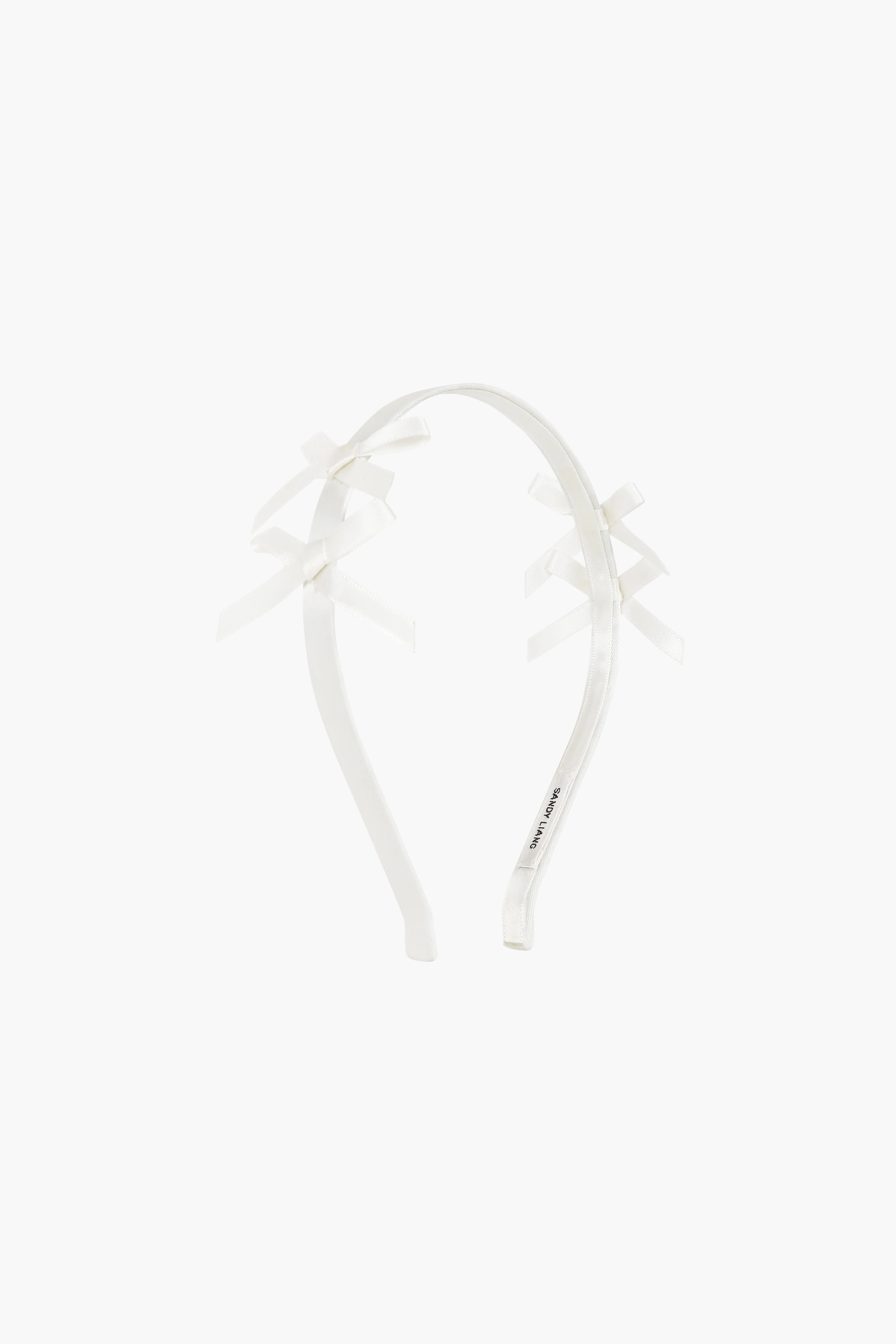 SERGIO HEADBAND IN HEAVY CREAM sold by Sandy Liang