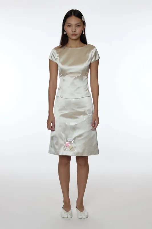 KEEPS SKIRT IN CHAMPAGNE SATIN made by Sandy Liang