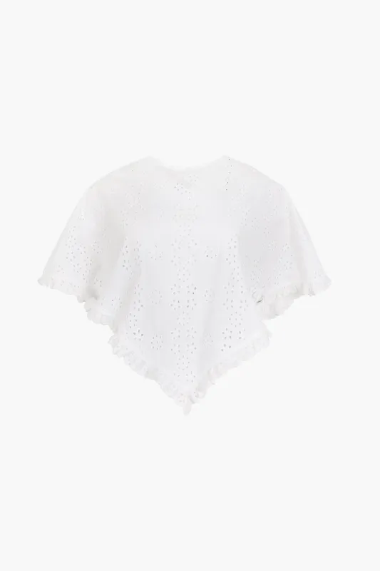 SOBA PONCHO IN WHITE EYELET made by Sandy Liang