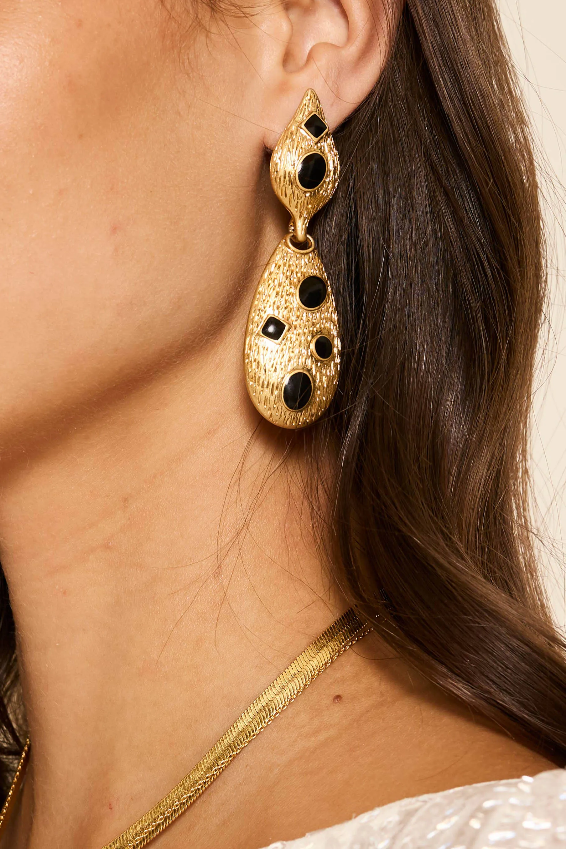 Falco - Gold & Black sold by RIXO