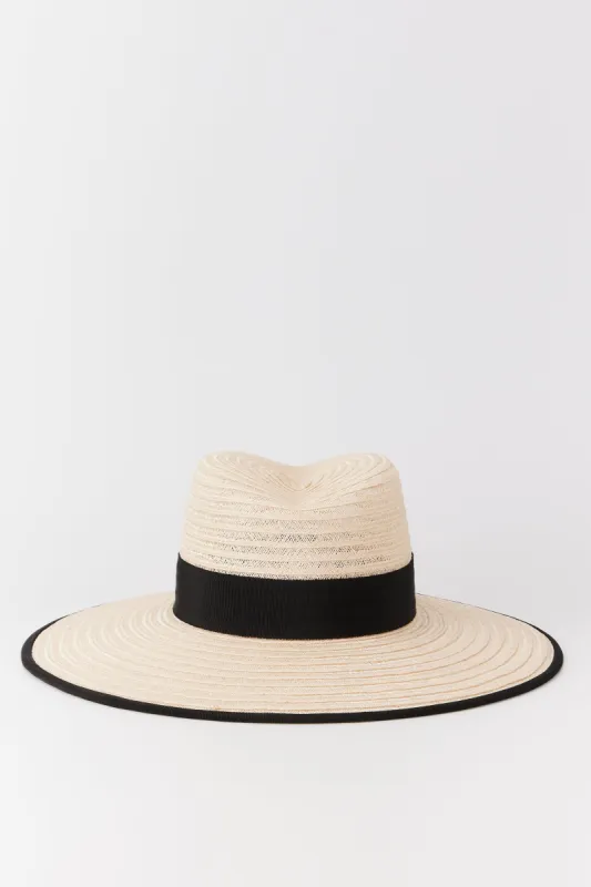 Natural straw hat with black band made by DESTREE
