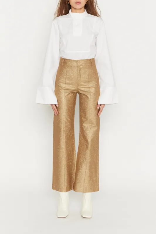 Gold metallic flared pants made by DESTREE