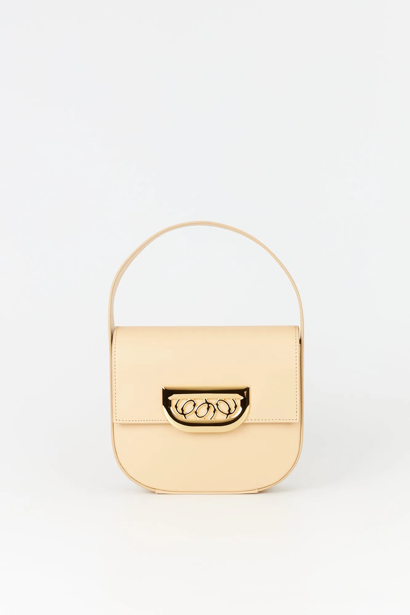 Beige leather handbag with golden latch sold by DESTREE