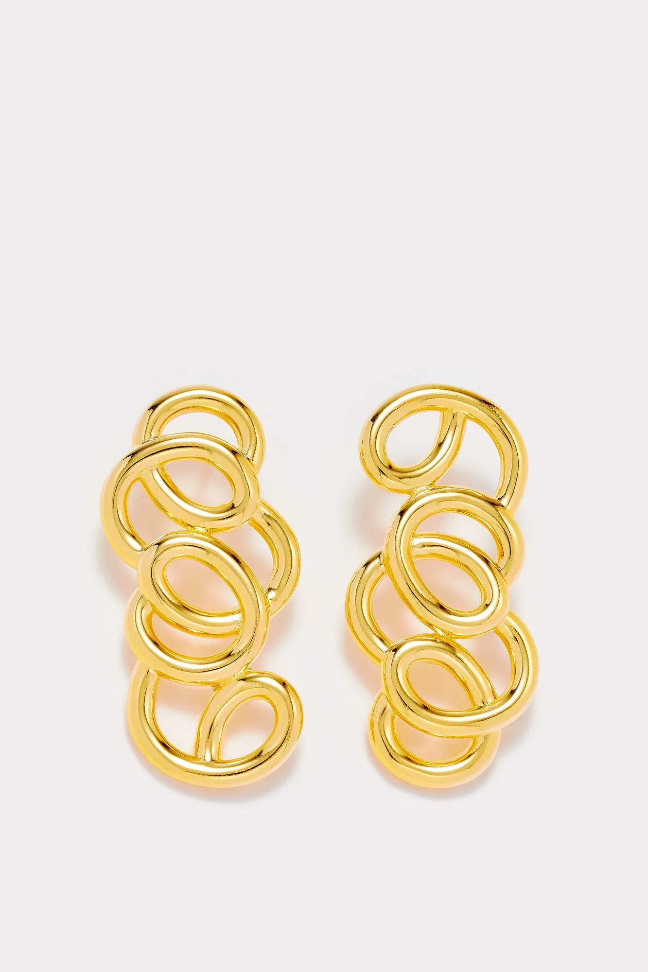 Long gold earrings sold by DESTREE