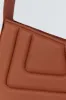 RUST Asymmetric Leather Quilted Mini Bag sold by DESTREE