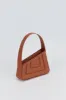 RUST Asymmetric Leather Quilted Mini Bag sold by DESTREE