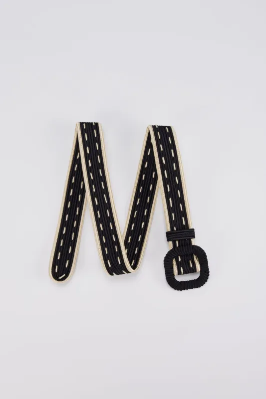 Black & white passementerie belt with contrast edging made by DESTREE