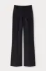 Black flared pants with circular pocket detail sold by DESTREE