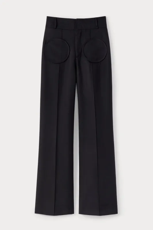 Black flared pants with circular pocket detail sold by DESTREE