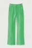 Apple green satin flared pants sold by DESTREE