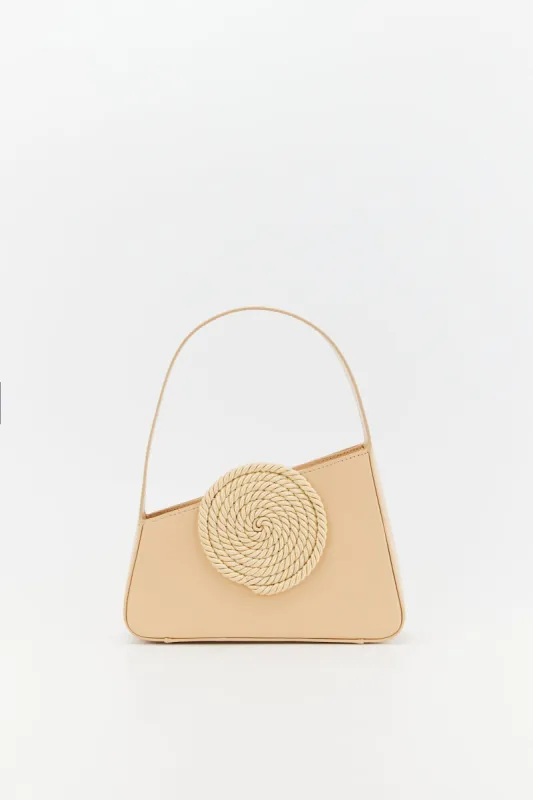 Beige asymmetric mini leather bag with passementerie details sold by DESTREE