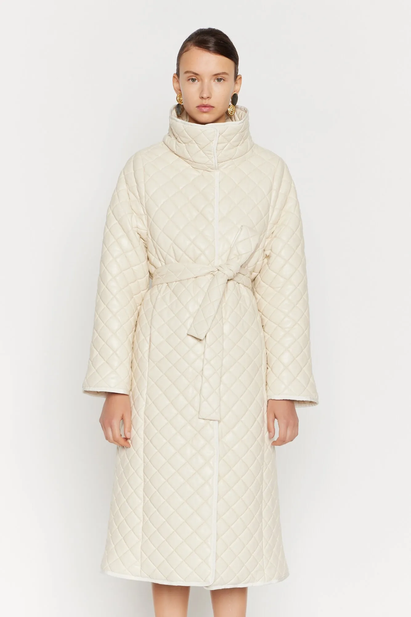 Ecru quilted puffer coat sold by DESTREE