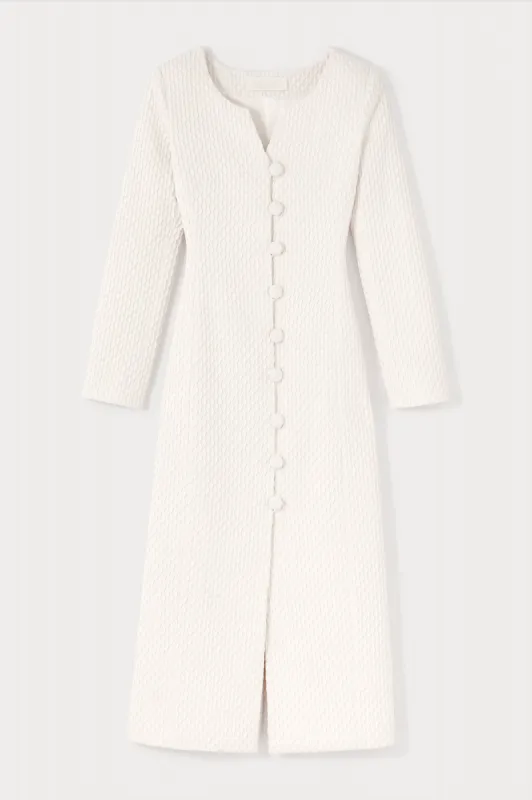 Ivory longline textured coat sold by DESTREE
