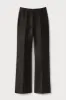 Black satin flared pants sold by DESTREE
