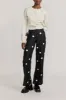 Off-white buttoned cropped cardigan sold by DESTREE