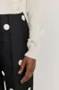 Off-white buttoned cropped cardigan sold by DESTREE