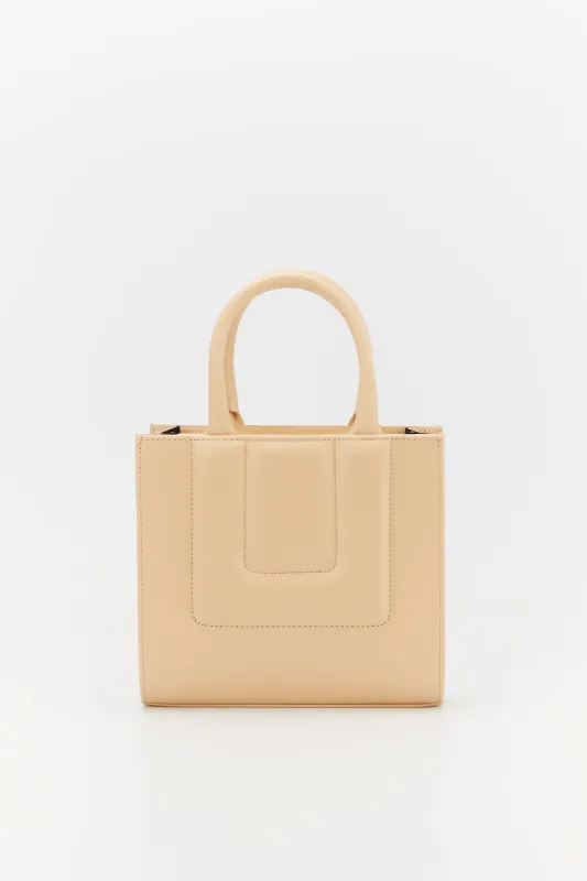 Quilted leather structured mini tote sold by DESTREE