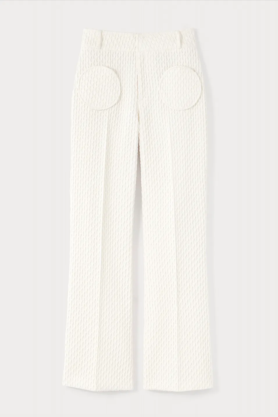 Ivory flutter flared pants with circular pockets sold by DESTREE