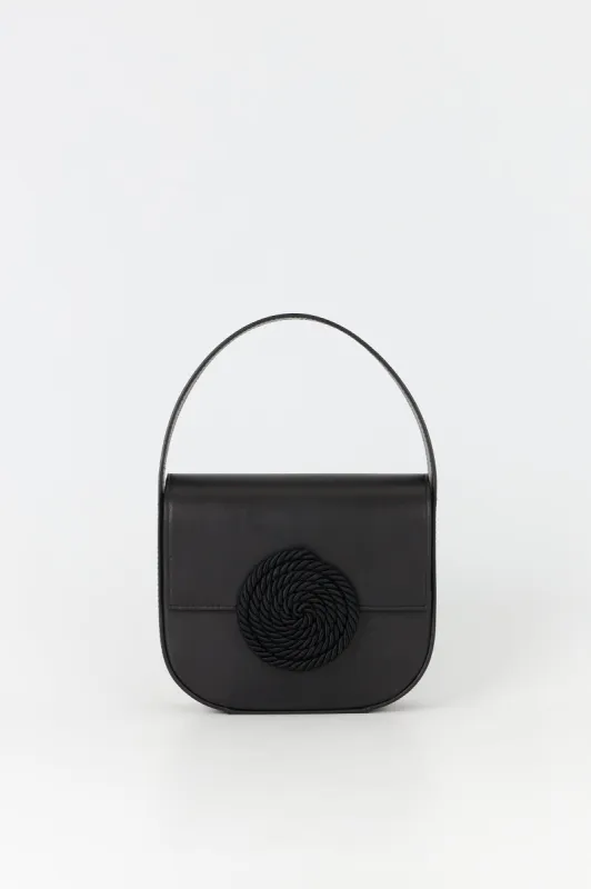 Geometric leather handbag with passementerie details made by DESTREE