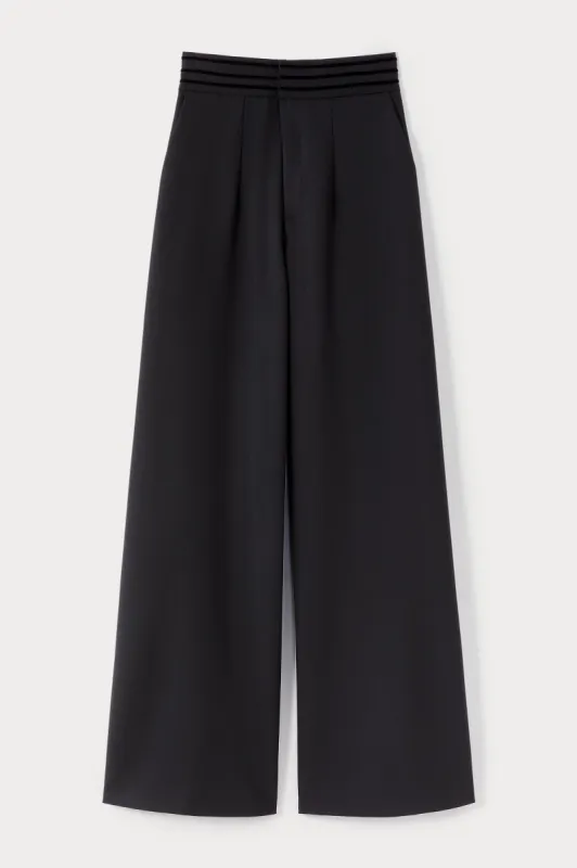 Black wide-leg pants with a tailored fit sold by DESTREE