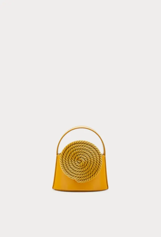 Leather mini bag with passementerie details mustard sold by DESTREE