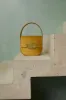 Antic gold satin handbag with golden latch sold by DESTREE