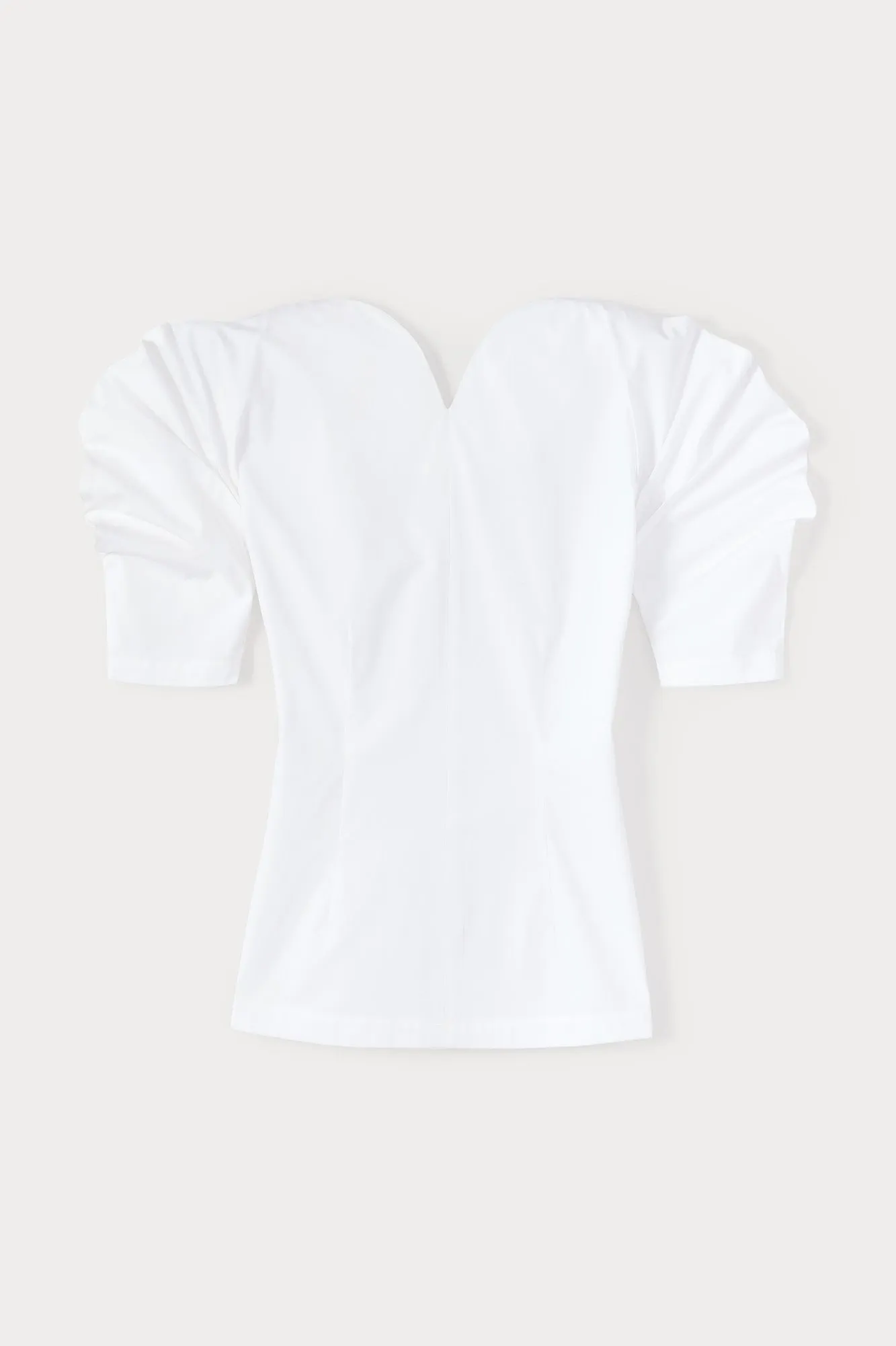 White popelin top with puff sleeves sold by DESTREE