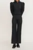 Black embossed flared pants sold by DESTREE