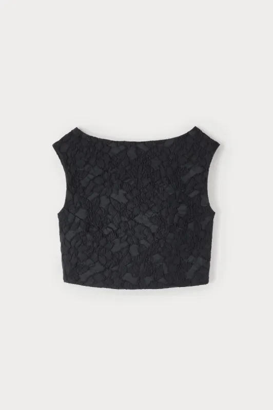 Black embossed crop top sold by DESTREE