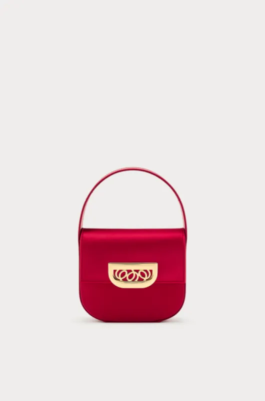 Red satin handbag with golden latch made by DESTREE