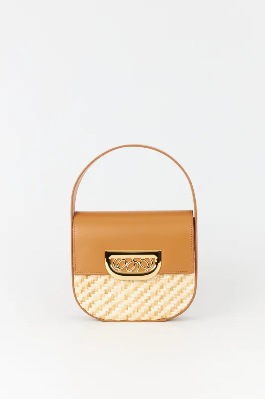 Straw handbag with golden latch made by DESTREE