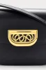 Black leather crossbody bag with golden clasp sold by DESTREE