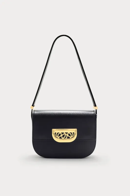 Black leather crossbody bag with golden clasp sold by DESTREE