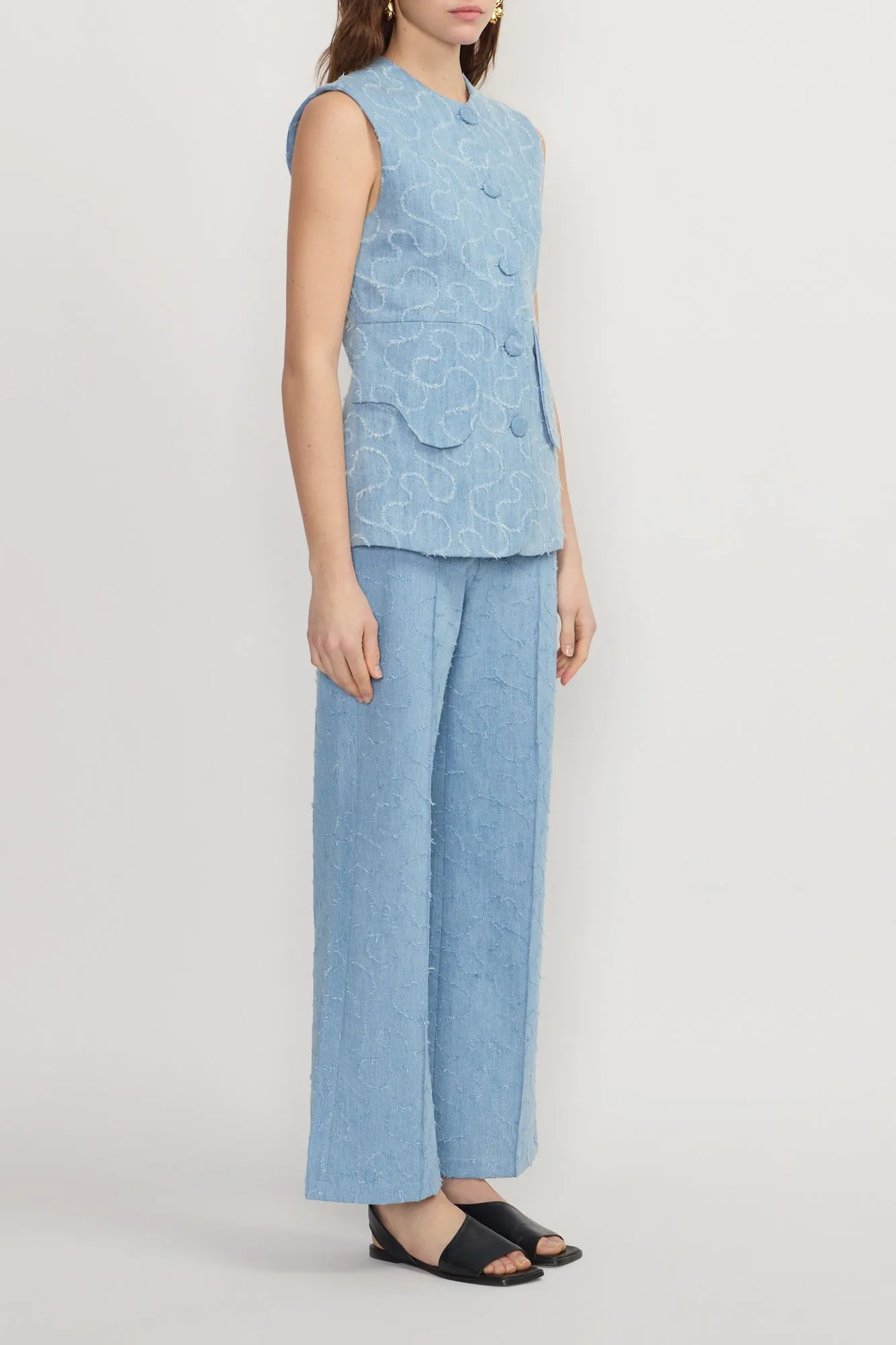 Blue embossed straight pants sold by DESTREE