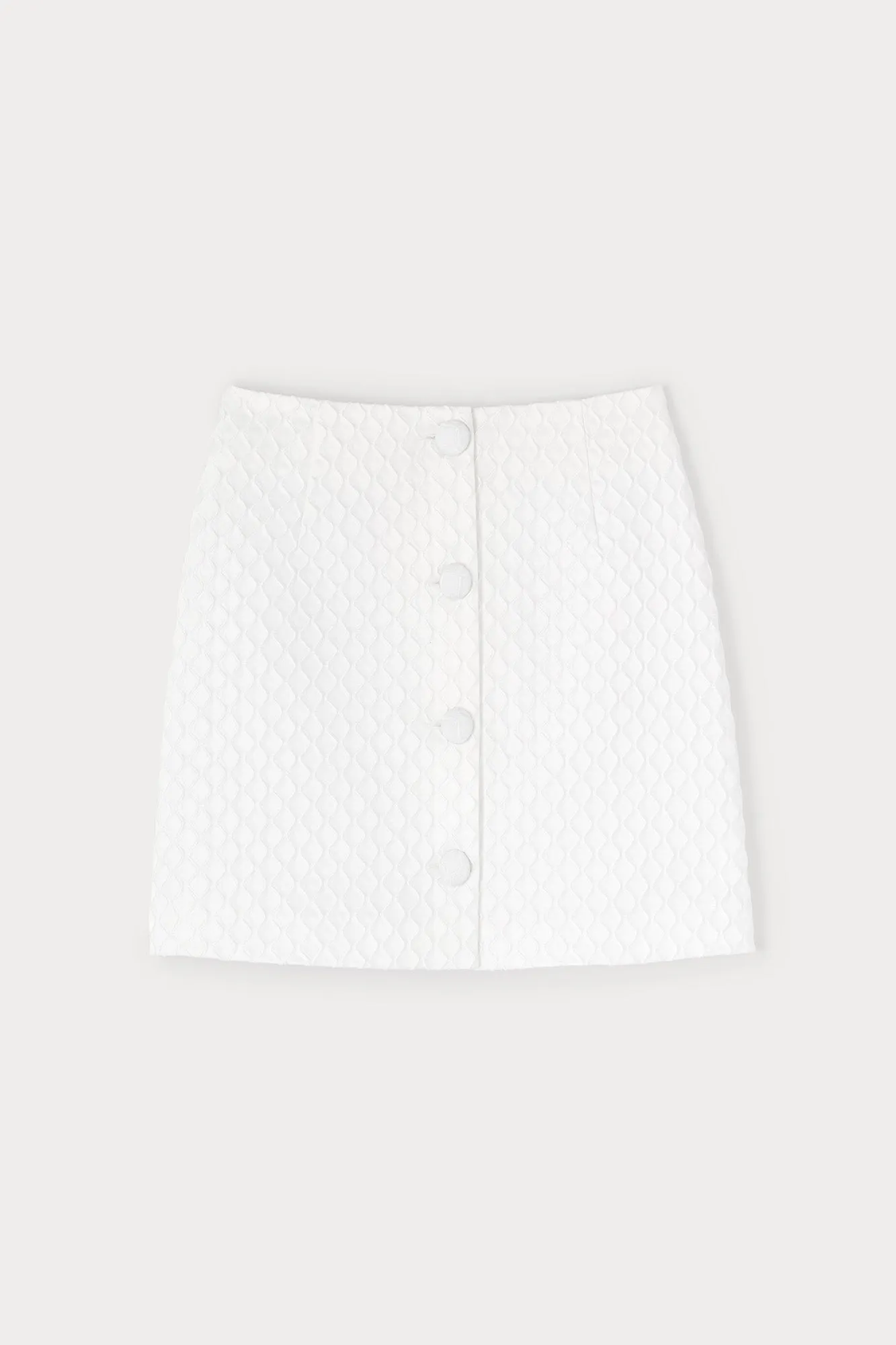 White geometric embossed skirt sold by DESTREE